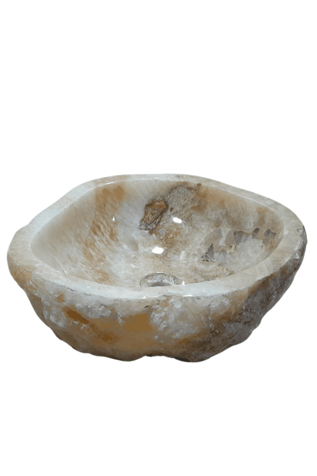 mooie natuurstenen ronde wasbak beige ruwe buitenkant onyx
